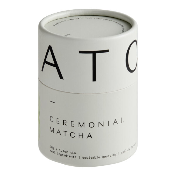 A cylindrical tin container of Dona Ceremonial Matcha Powder, 30 grams (1.06 oz.).