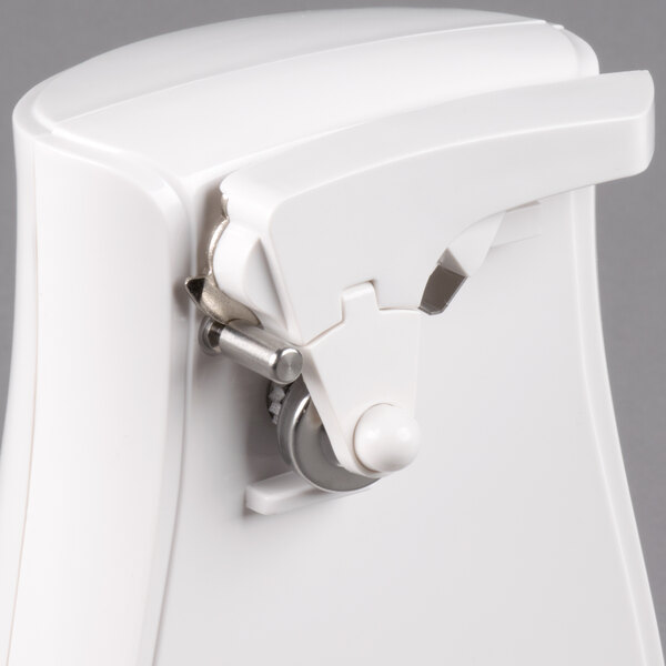 A white Proctor Silex electric can opener with a silver circle.