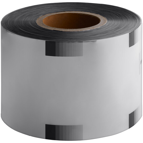 A roll of clear sealing film with a black label.