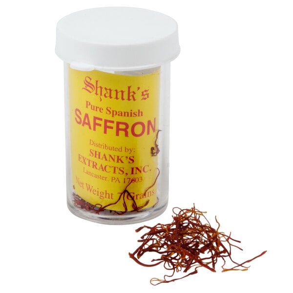 A case of 12 jars of Shank's Spanish Saffron with white lids.