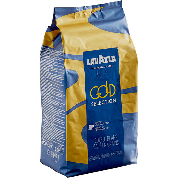 A blue and yellow bag of Lavazza Gold Selection whole bean espresso coffee on a white background.
