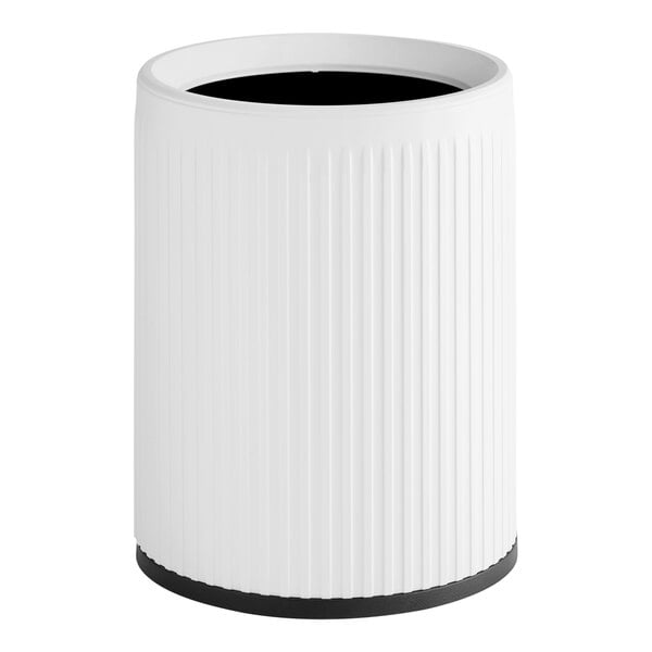 A white round decorative polyethylene wastebasket with a ribbed exterior and black base.
