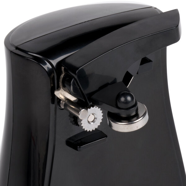 A black Proctor Silex electric can opener with a silver knife sharpener on a counter.
