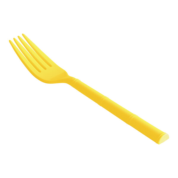 A close-up of a yellow reusable polycarbonate fork.