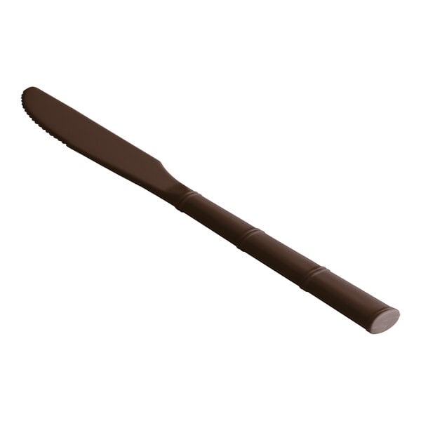 A brown Design Specialties polycarbonate knife with a long handle.