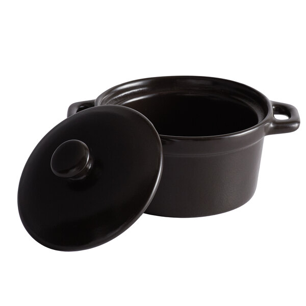 An Acopa Keystone black porcelain mini casserole dish with lid.