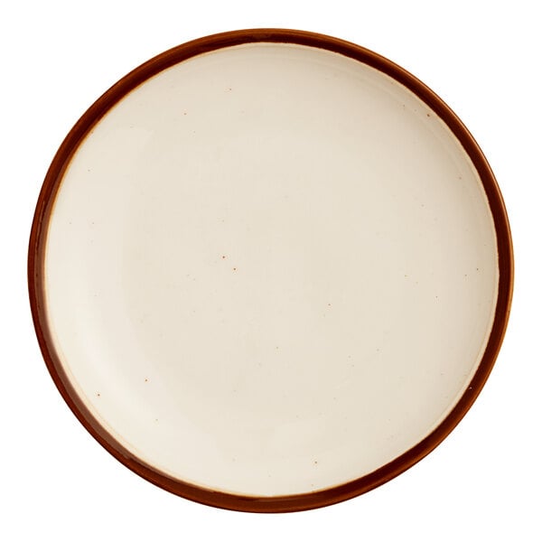 An Acopa Keystone porcelain coupe plate with a white center and brown rim.