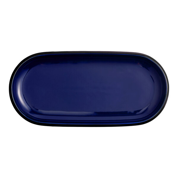 An Acopa Azora Blue porcelain oblong coupe platter with a black rim.