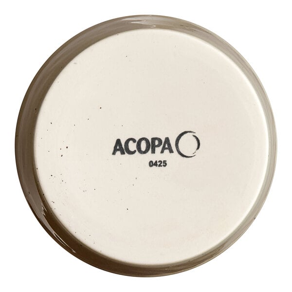 A white porcelain ramekin with the word "Acopa" in black text.