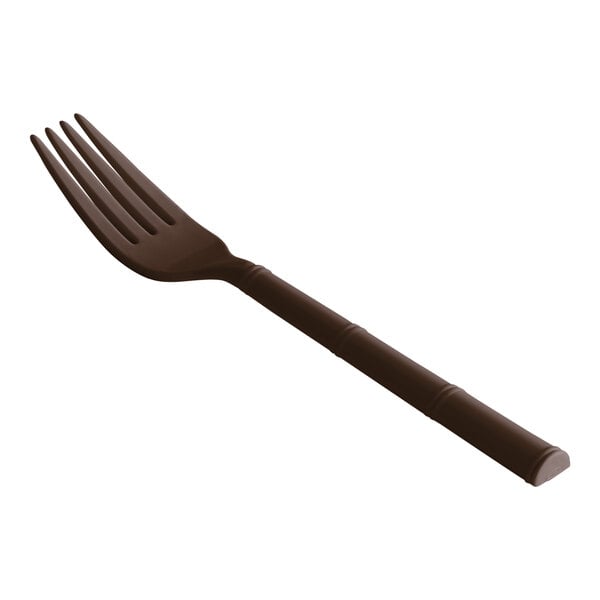 A brown polycarbonate fork with a brown handle.