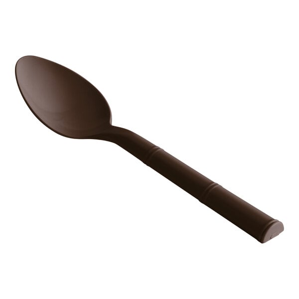 A brown Design Specialties polycarbonate teaspoon with a handle.