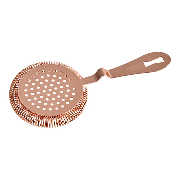 A copper Barfly Hawthorne strainer with a handle and holes.
