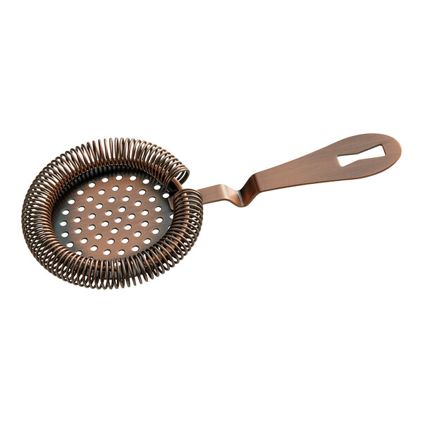 A Barfly antique copper Hawthorne strainer with a handle and metal wire with holes.
