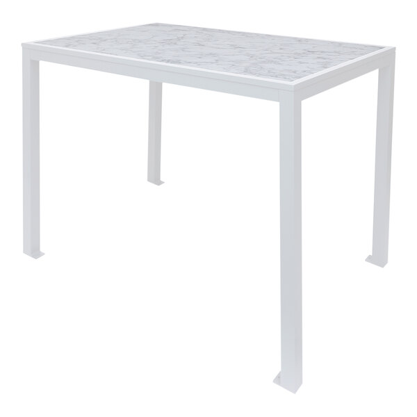 A BFM Seating white aluminum bar height table with a Carrara marble top.