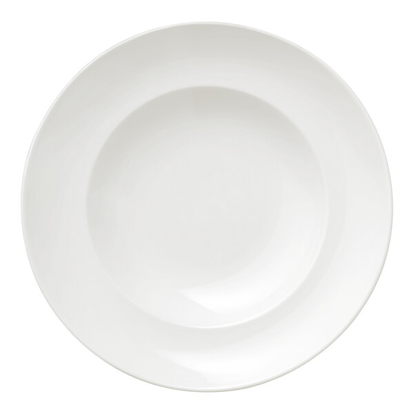 A close up of a Libbey round white porcelain pasta bowl with a round rim.