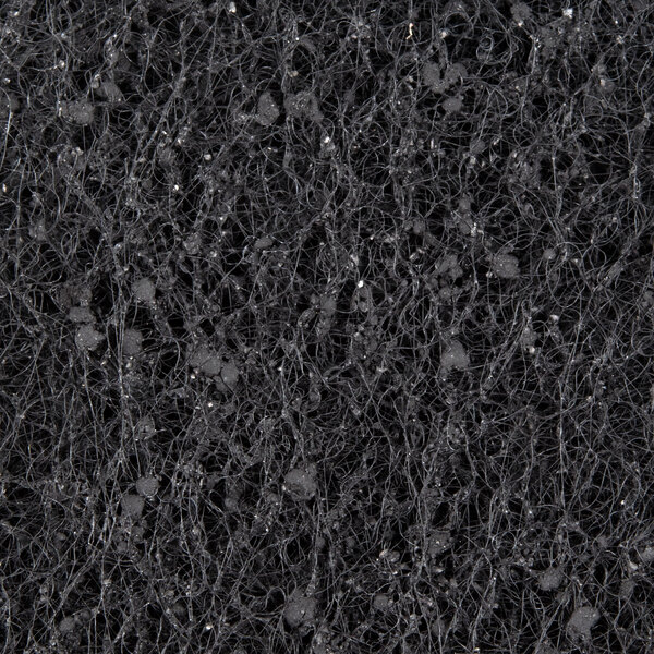 A close-up of a grey sponge.