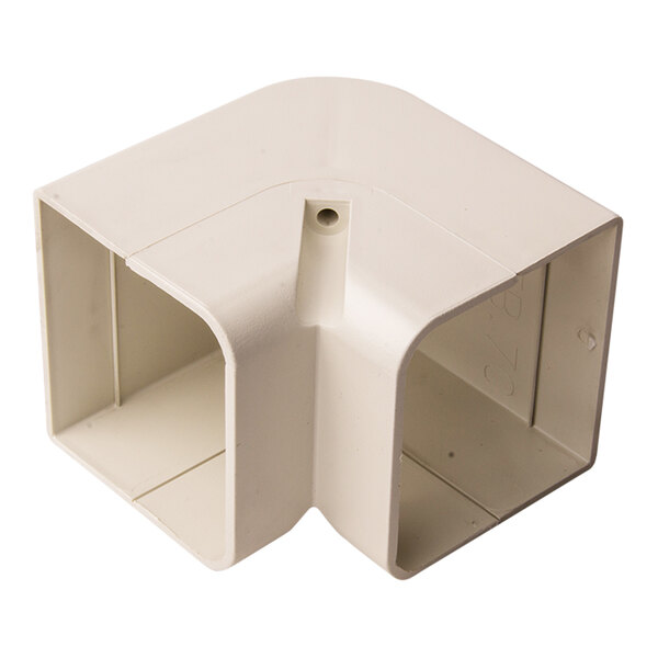 A white plastic corner elbow with two holes.