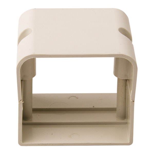 A white plastic DiversiTech natural union coupling with two holes.