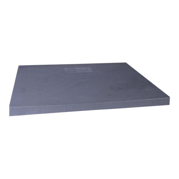 A grey rectangular DiversiTech equipment pad with a label on it.