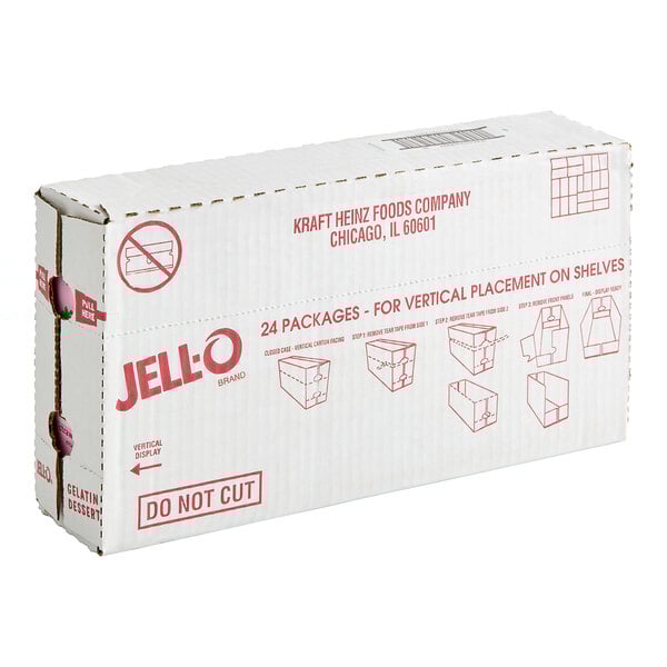 A white JELL-O food service box with red writing on a kitchen counter.