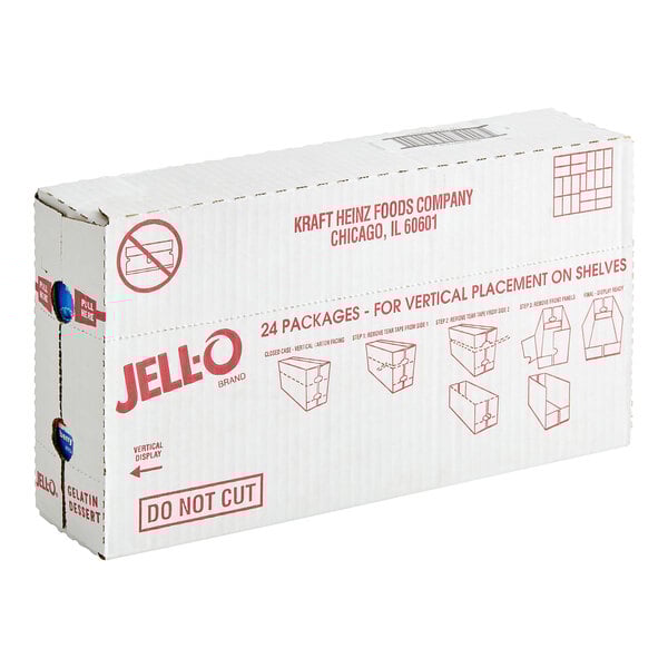A white box of JELL-O Berry Blue Gelatin Dessert Mix with red text on a counter.