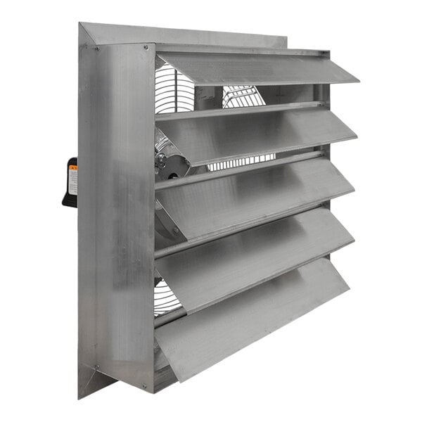 A stainless steel Canarm shutter-mounted exhaust fan with a large metal fan and ventilators.