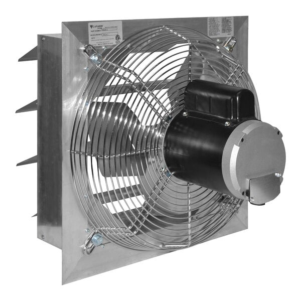 A metal shutter-mounted exhaust fan with a protective wire grille and a cylindrical motor housing attached to the back.