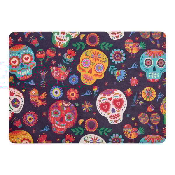 A rectangular paper placemat featuring a colorful sugar skull and floral pattern.