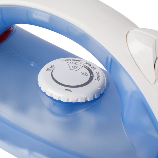 A close-up of a white Hamilton Beach iron with a white button.