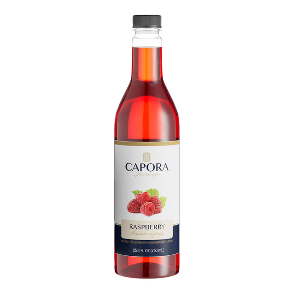 A bottle of Capora Raspberry Flavoring Syrup with a white label.