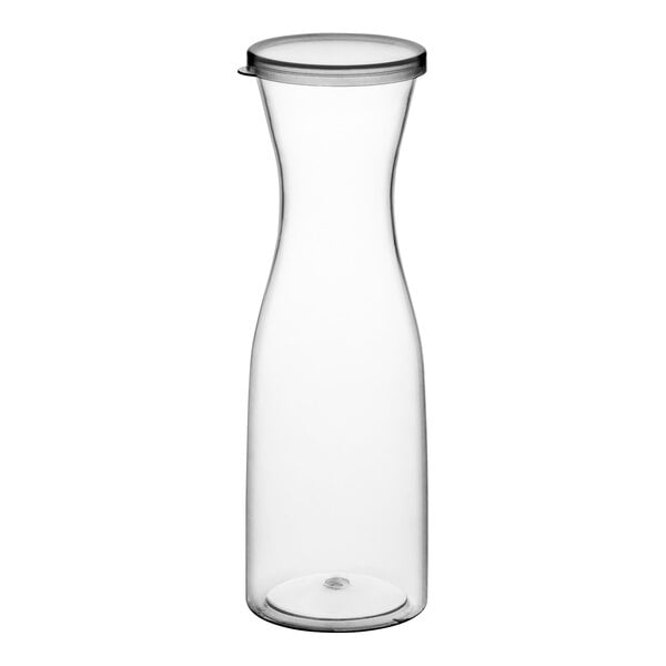 A clear plastic carafe with a lid.