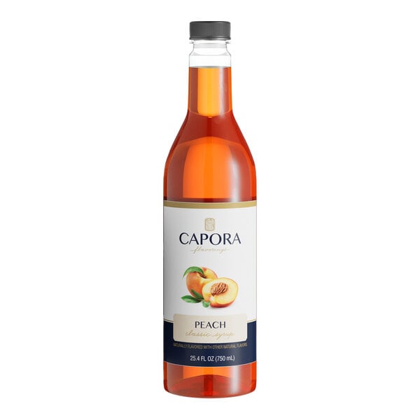 A bottle of Capora Peach Flavoring Syrup with a white label.