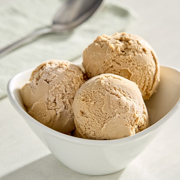 A bowl of G.S. Gelato Cold Brew Coffee gelato with three scoops.