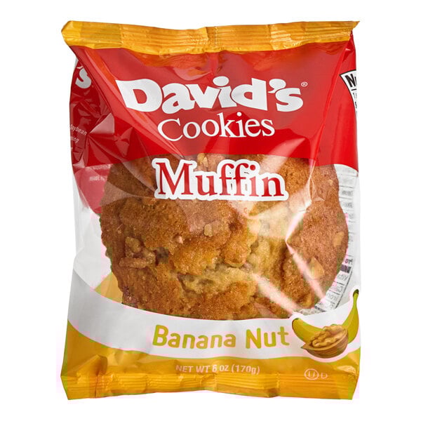 A close up of a David's Cookies banana nut muffin in a bag.
