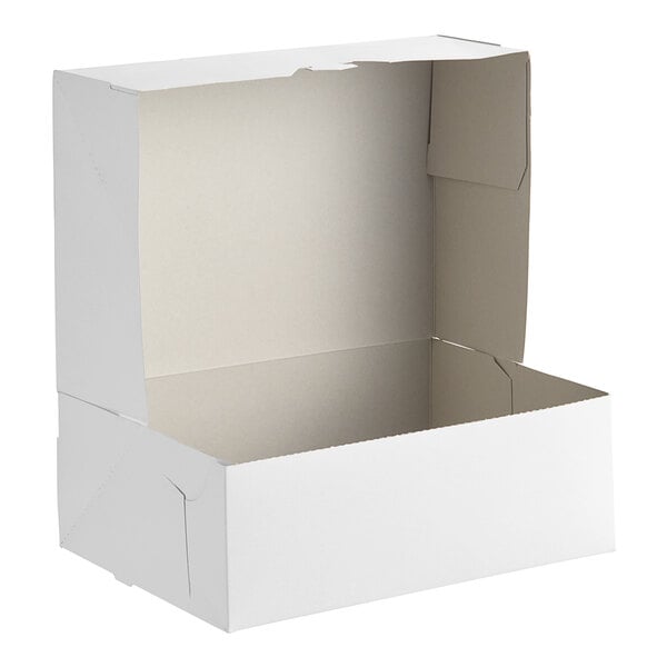 A white Baker's Lane cake box with a lid open.
