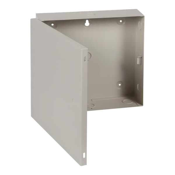A gray metal indoor industrial control panel enclosure with a door.