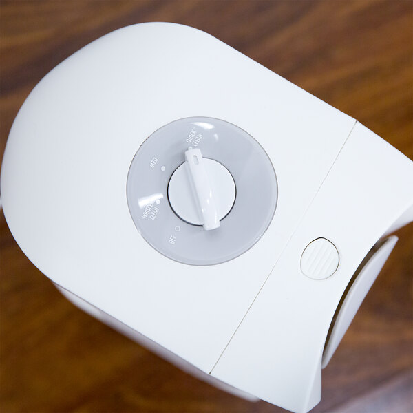 A white Hamilton Beach air purifier with a dial.