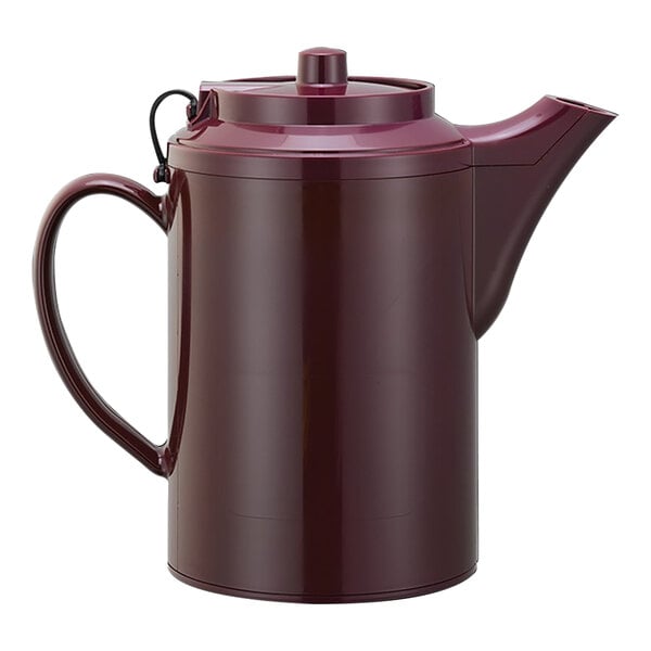 A red Service Ideas plastic teapot with a tethered lid.