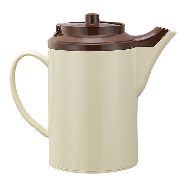 A white and brown stoneware teapot with lid.