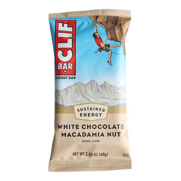 A white Clif Bar with white chocolate and macadamia nuts.