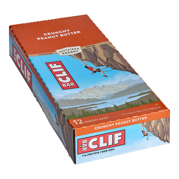 A box of Clif Bar Crunchy Peanut Butter Energy Bars on a table.