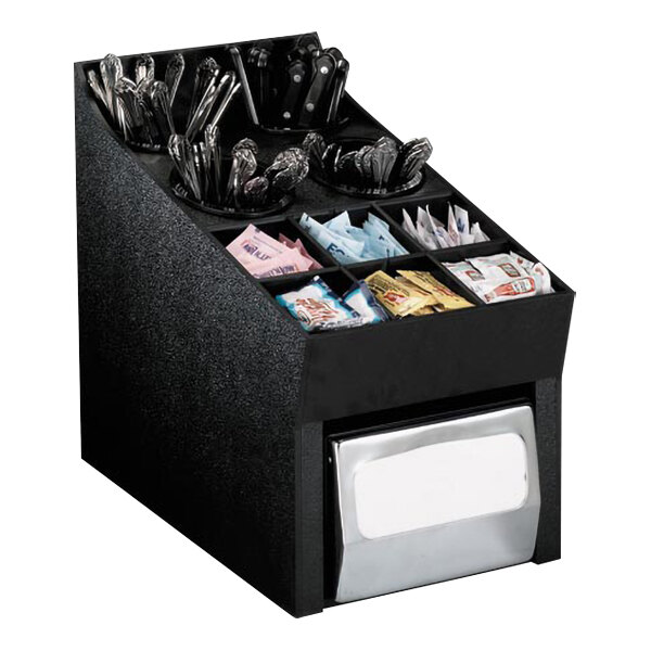 A black Dispense-Rite countertop organizer with condiments, flatware, and napkins.