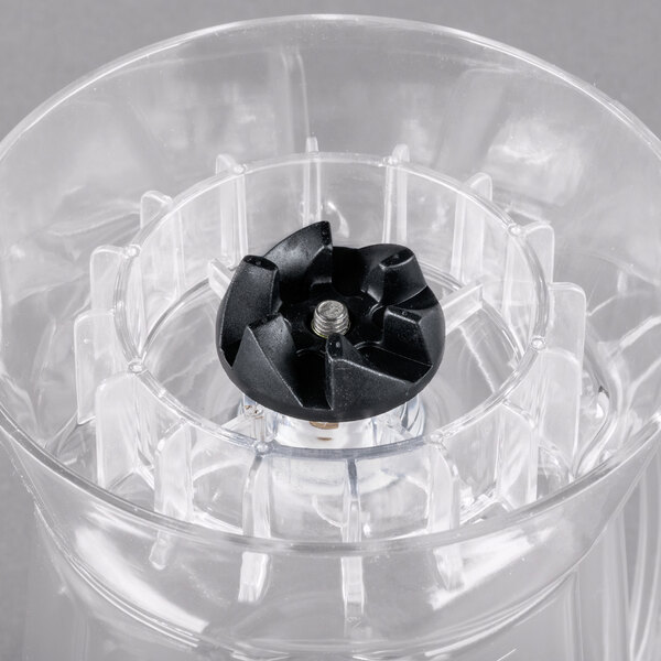 A clear plastic Proctor Silex blender with a black blade.