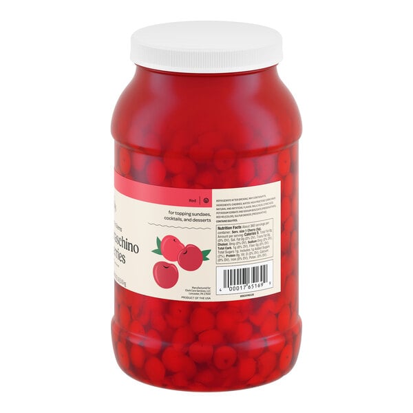 A large plastic jar of Hometown Provisions maraschino cherries without stems.