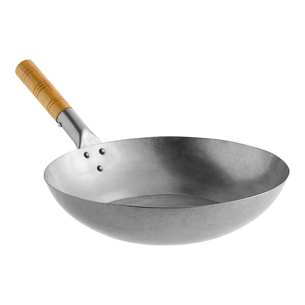 A 14-inch carbon steel flat bottom wok with a wooden handle.