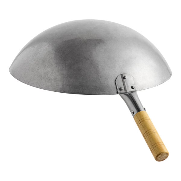 A large carbon steel Mandarin wok with a wooden handle.