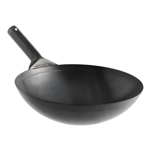 A black, heavy-duty oxidized carbon steel mandarin wok with a single handle.