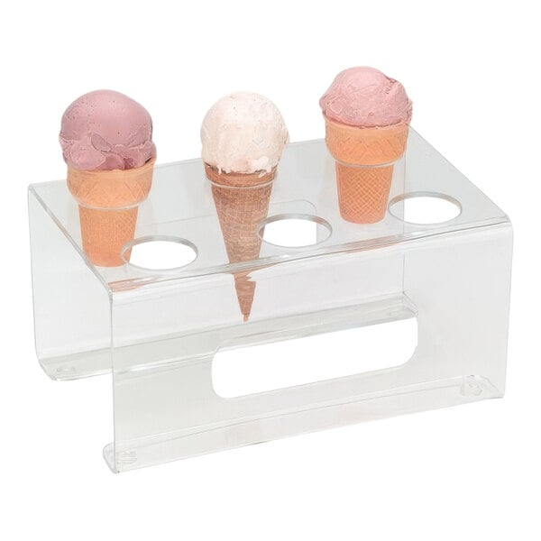 A group of ice cream cones on a clear plastic holder.