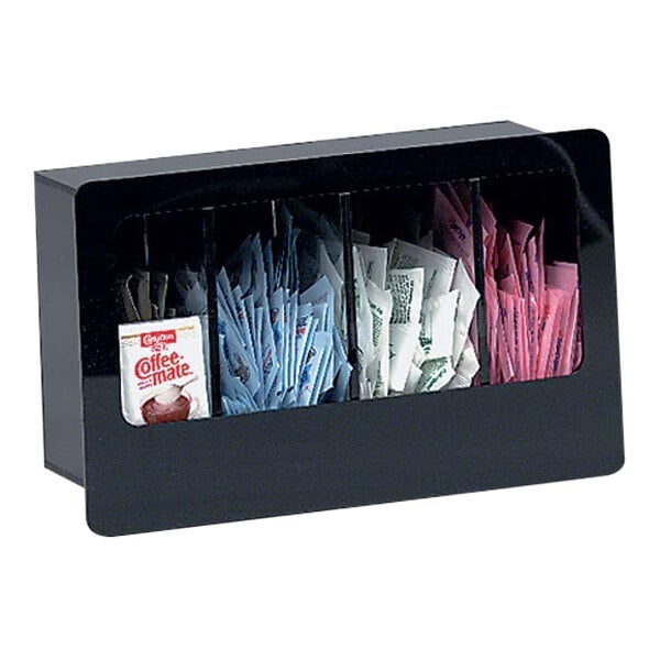 A black Dispense-Rite condiment organizer with several packets inside.