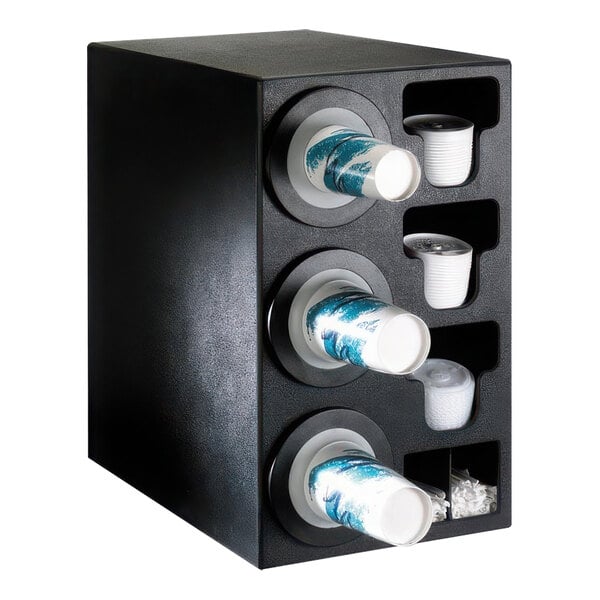 A black Dispense-Rite countertop cup dispenser with plastic cups and lids in it.